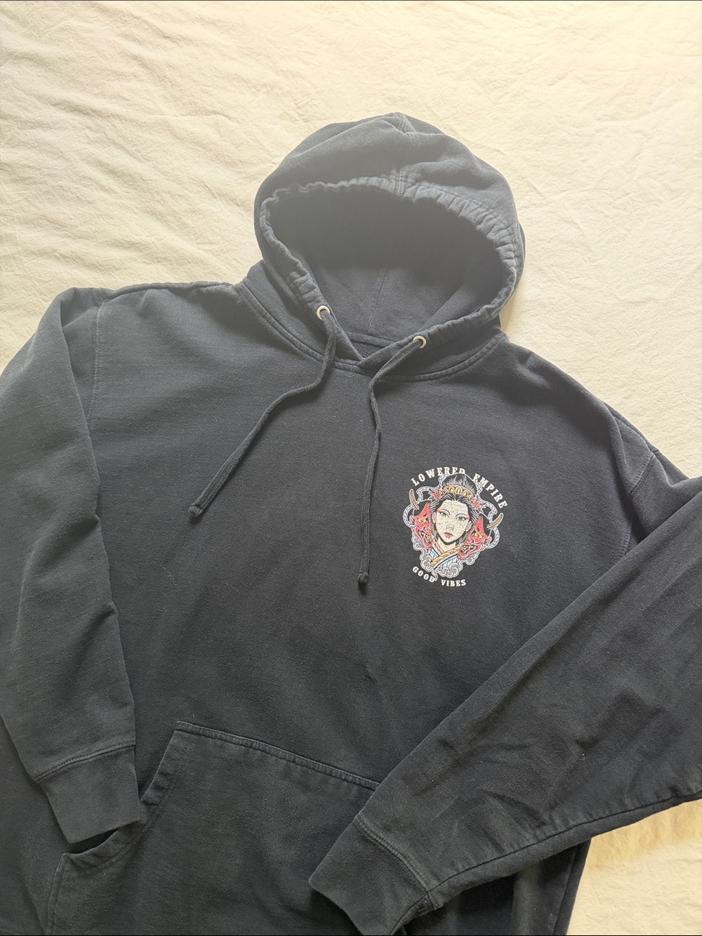 Men's Black Pullover Hoodie with Graphic Chest Emblem